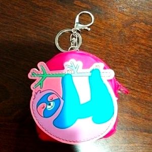 A sloth backpack keychain